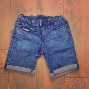 Blue shorts above knee